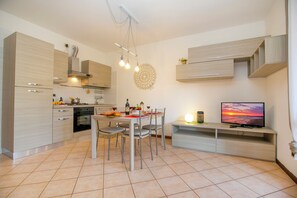 Family Apartment, Multiple Bedrooms (Borgo Degli Ulivi shared pool- 200m) | Dining - Borgo Degli Ulivi shared pool- 200m lake (Toscolano Maderno)