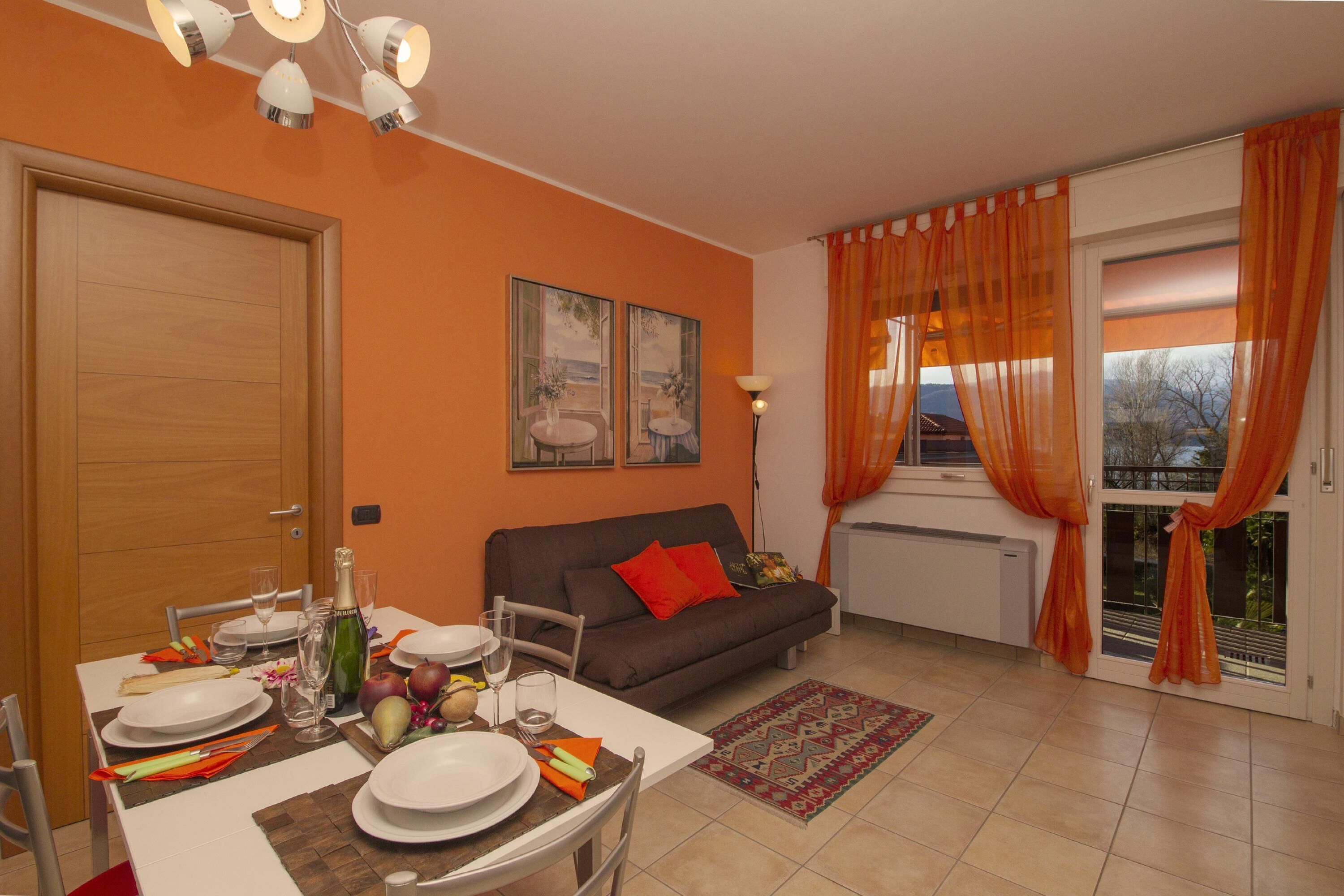 Family Apartment, Multiple Bedrooms, Lakeside (Casa Fiorita Pool and Lake) | Living area | Flat-screen TV