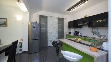 House (One Bedroom Home with Pool) | Private kitchen | Fridge