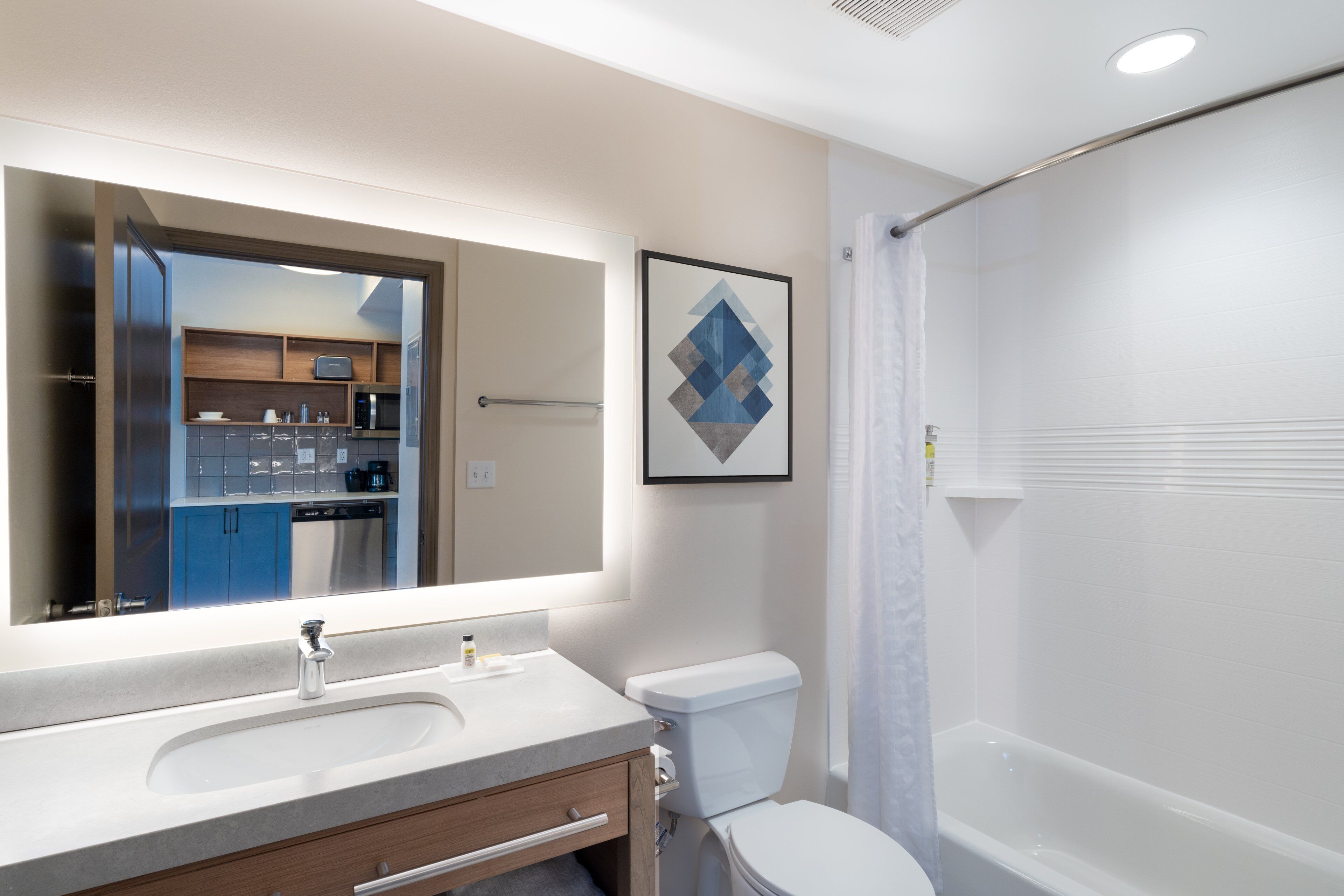 hair dryer, bathrobes, towels