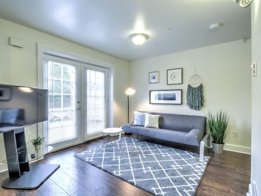 Design Condo, 1 Bedroom | Living area | 54-inch flat-screen TV with cable channels, TV