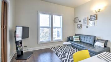 54-inch flat-screen TV with cable channels, TV