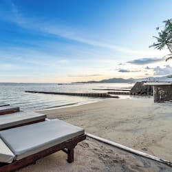 Private beach, white sand, sun loungers, beach umbrellas