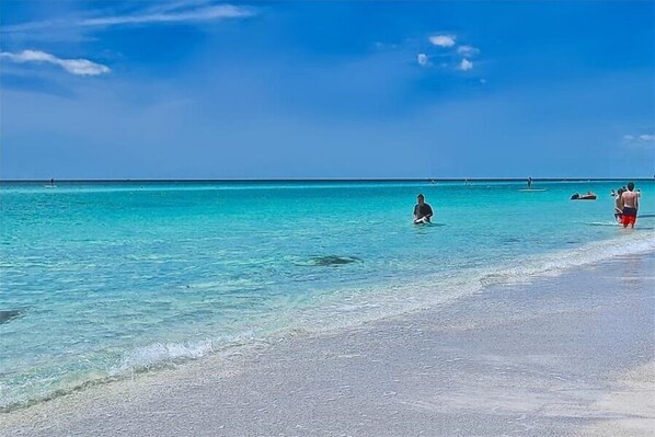 On the beach, sun loungers