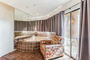 Shower, hair dryer, towels, shampoo