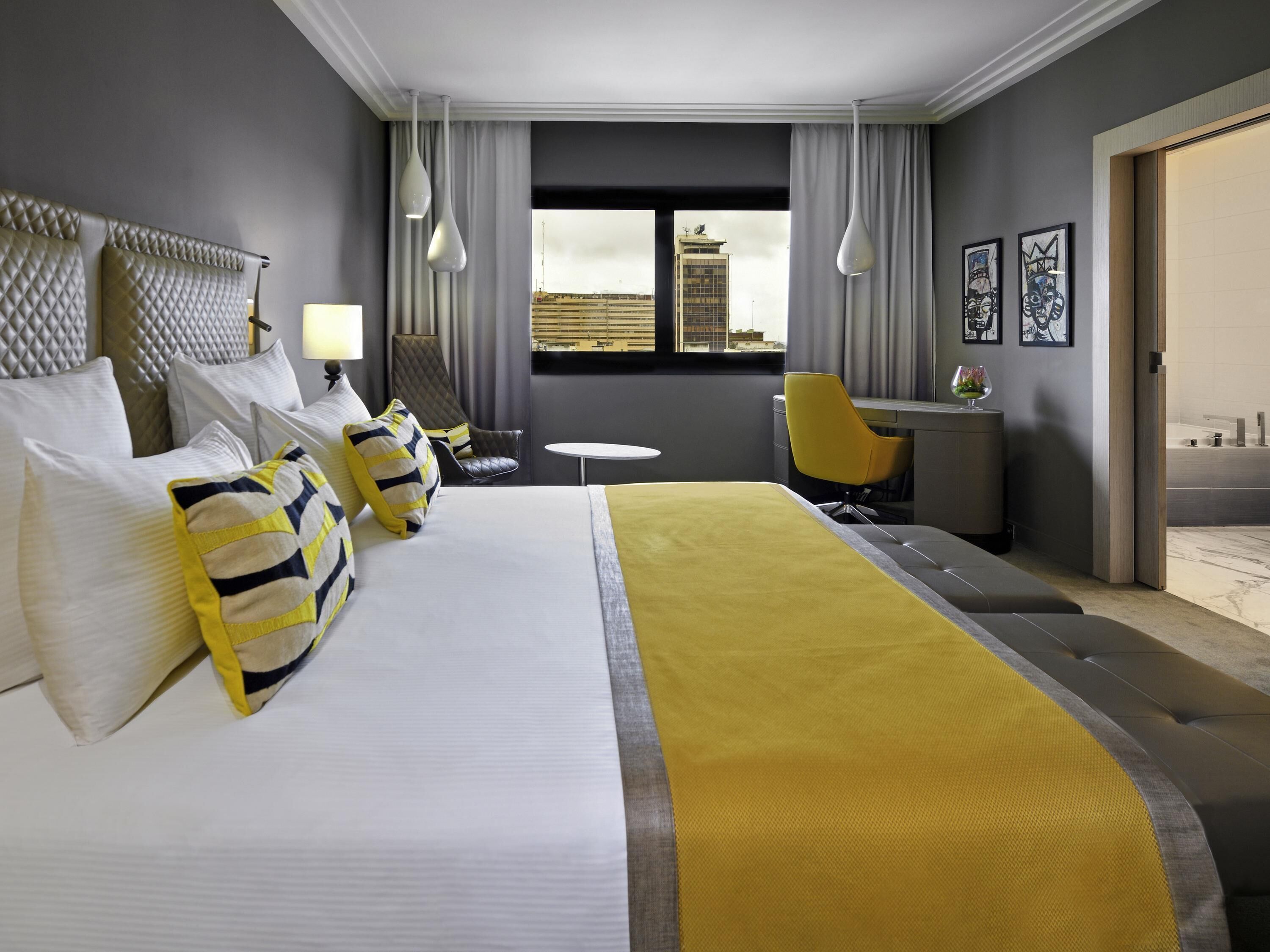 Deluxe Room, Multiple Beds | Premium bedding, minibar, desk, laptop workspace