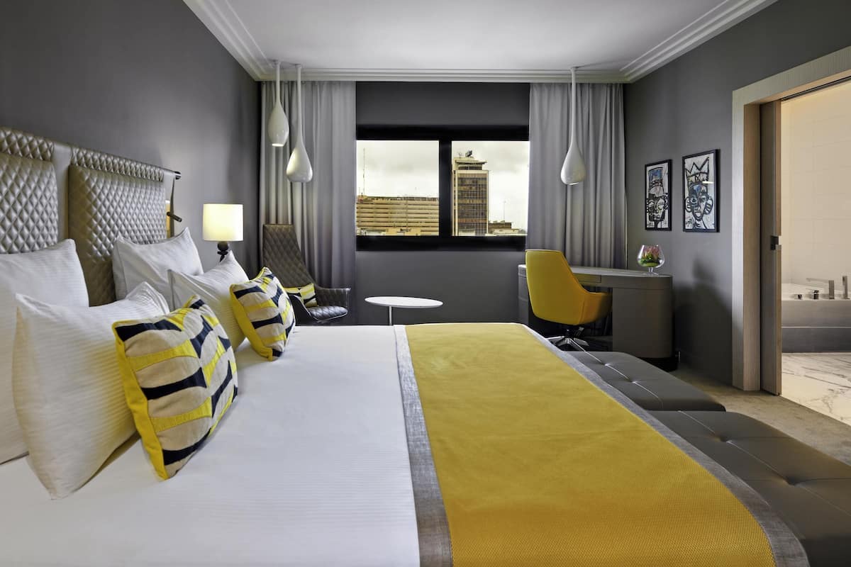 Deluxe Room, Multiple Beds | Premium bedding, minibar, desk, laptop workspace