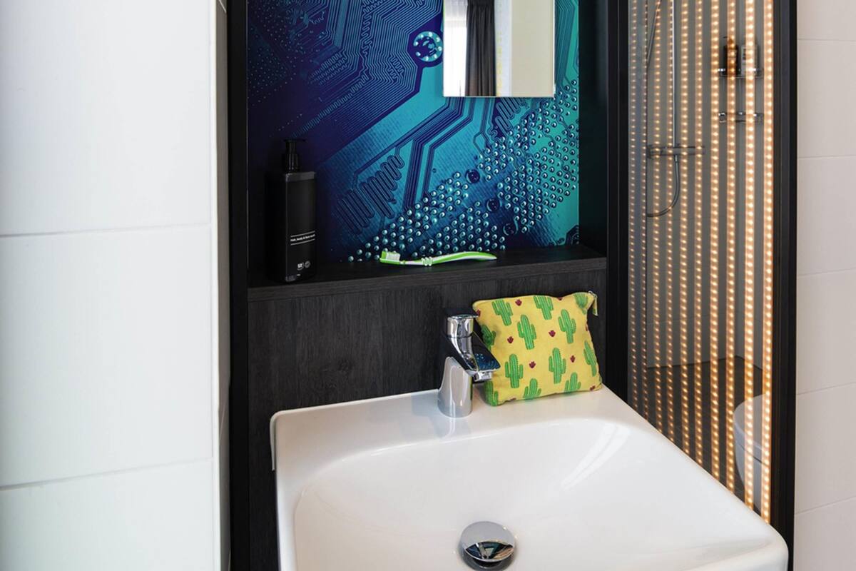 family room, 1 double bed with sofa bed | in-room safe, blackout curtains, free wifi