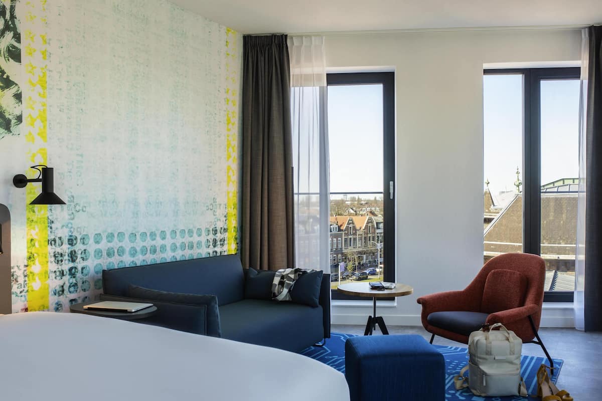 family room, 1 double bed with sofa bed | in-room safe, blackout curtains, free wifi