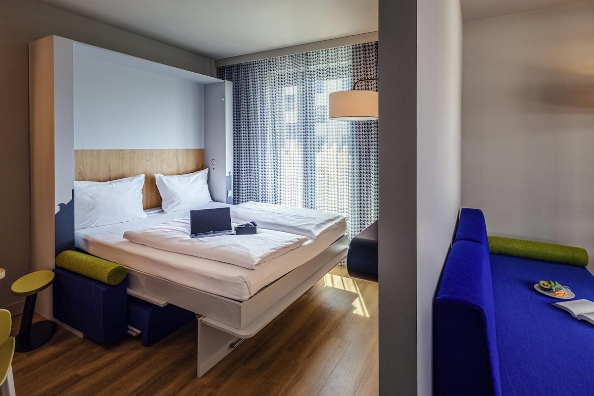 Studio, Multiple Beds, Balcony | In-room safe, desk, blackout drapes, soundproofing