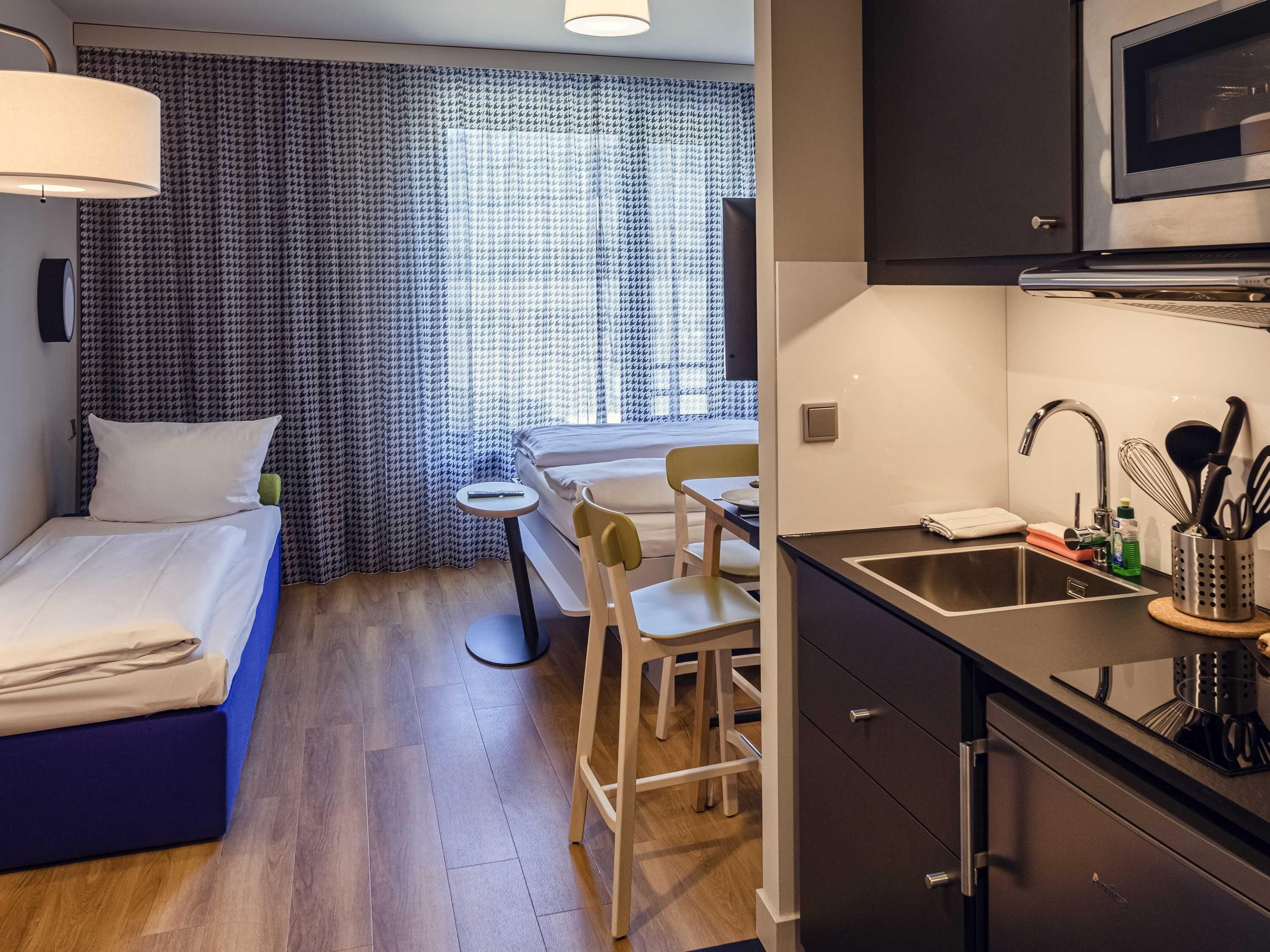 studio, multiple beds | in-room safe, desk, blackout curtains, soundproofing