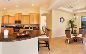 Fridge, microwave, oven, stovetop - Direct Access to Gulf, Waterfront Pool Home (Cape Coral)