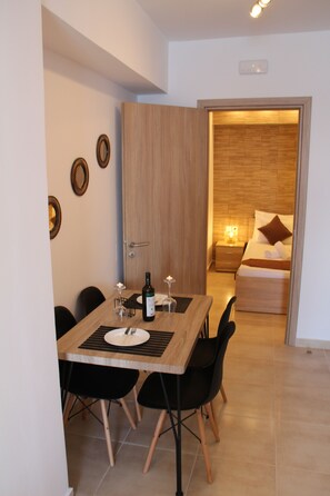 Apartamento Deluxe | Comedor