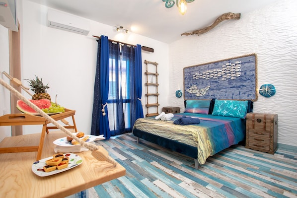 Habitación doble Deluxe | Ropa de cama de alta calidad y caja de seguridad en la habitación