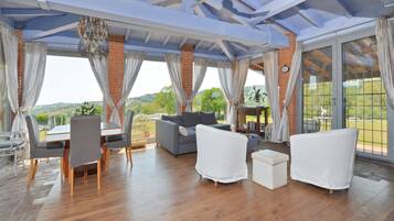 Family Villa, 3 Bedrooms, Mountainside (Villa Borgiano) | Living area | 21-inch flat-screen TV with digital channels, TV, fireplace