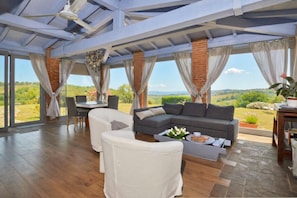 Family Villa, Multiple Bedrooms, Mountainside (Villa Borgiano) | Living area | 21-inch flat-screen TV with digital channels, TV, fireplace