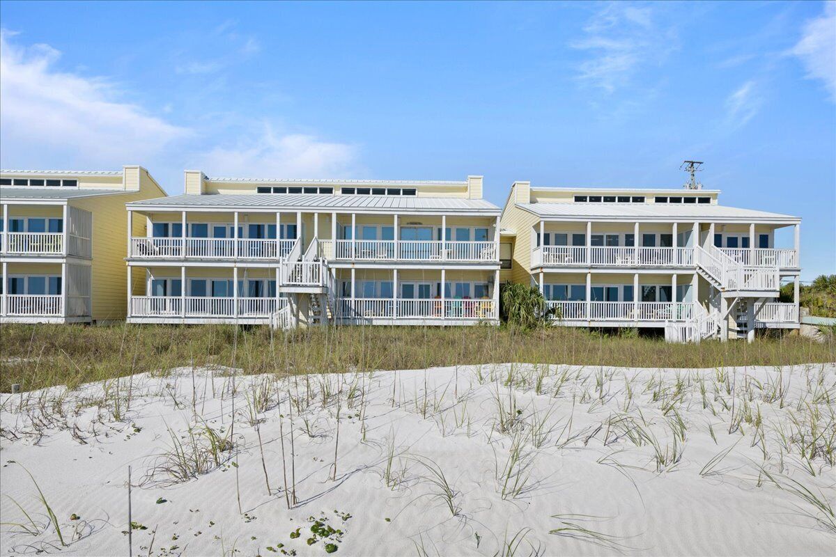 Brightly decorated low rise BEACHFRONT condo! Sought after west end of PCB - Harbor Arms #7