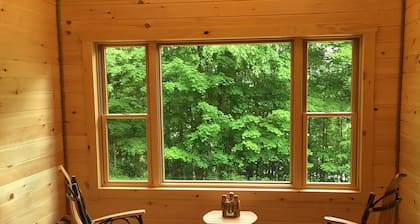 Upstate New York retreat nestled between Adirondacks and Tug Hill Plateau.