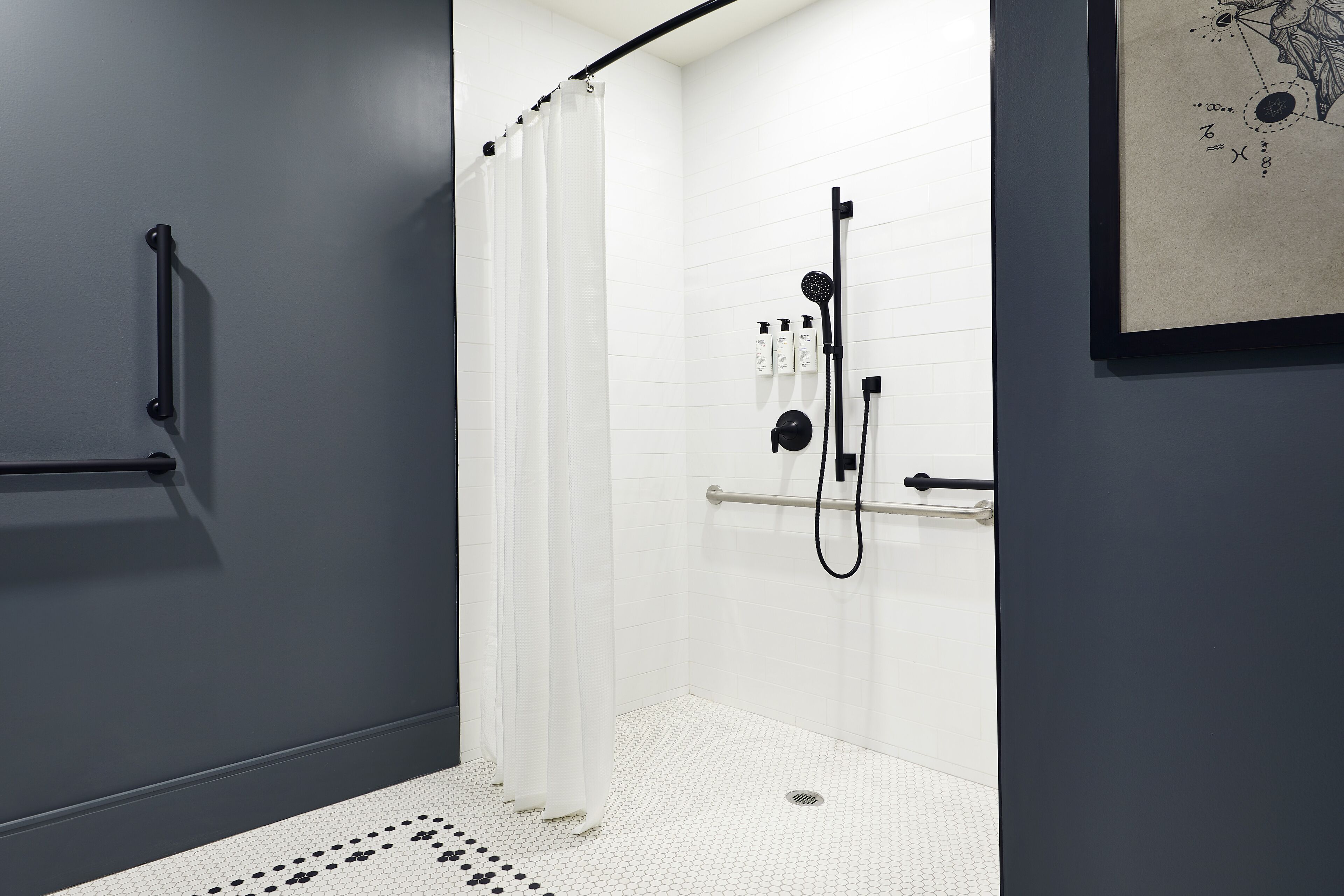 designer toiletries, hair dryer, bathrobes, towels