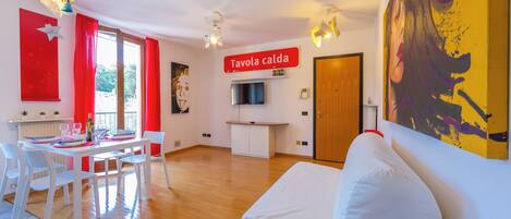 Family Apartment, Multiple Bedrooms (Claz House) | Living area | 21-inch flat-screen TV with cable channels, TV