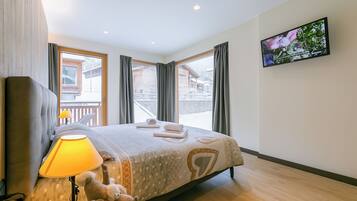 Apartamento família, vários quartos (Casa Luminosa Ski in -Ski out 100m) | 2 quartos, Wi-Fi de cortesia, roupa de cama