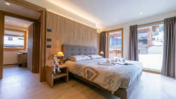 Apartamento família, vários quartos (Casa Luminosa Ski in -Ski out 100m) | 2 quartos, Wi-Fi de cortesia, roupa de cama