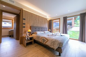 Familienapartment, Mehrere Schlafzimmer (Casa Luminosa Ski in -Ski out 100m) | 2 Schlafzimmer, kostenloses WLAN, Bettwäsche