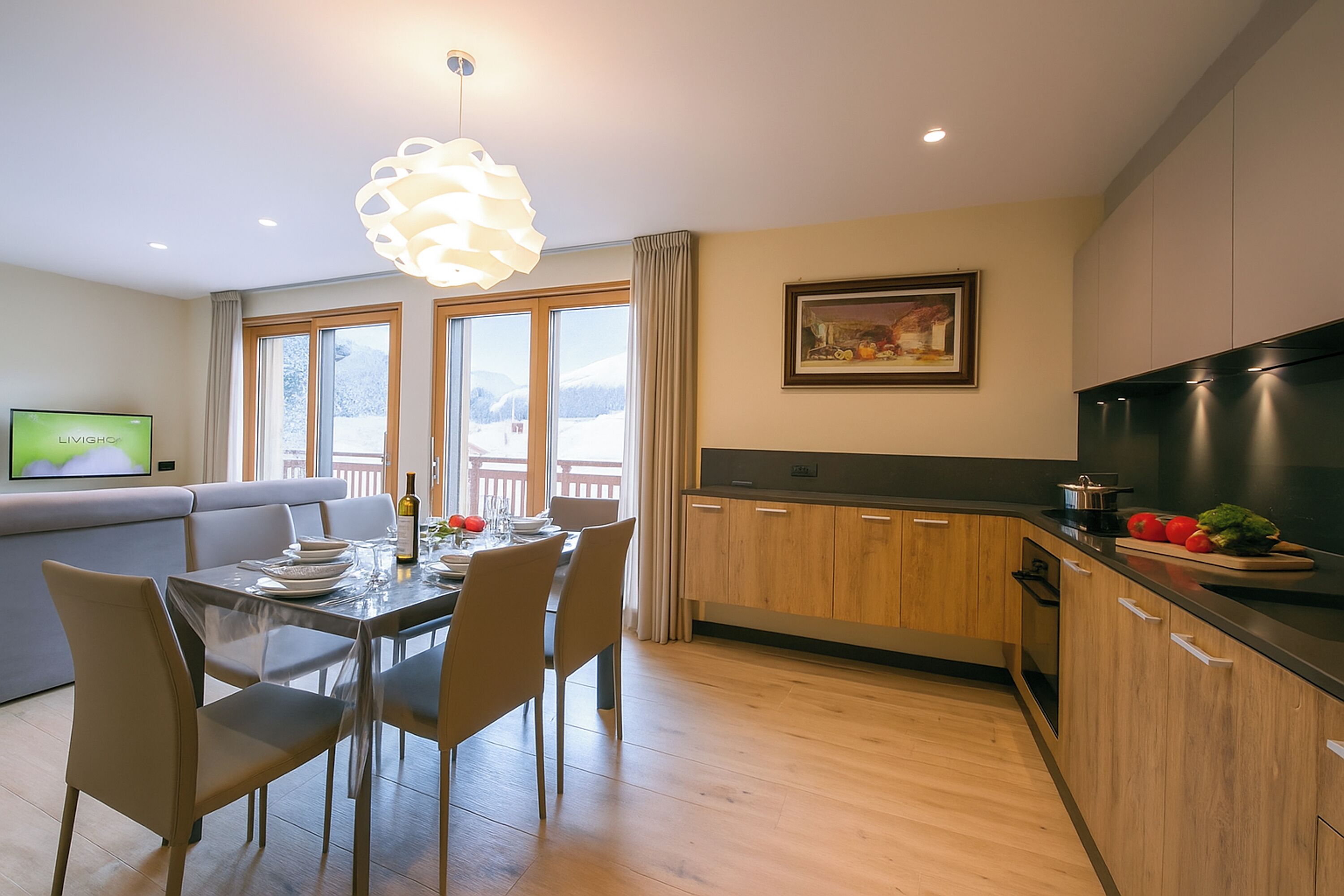 Family Apartment, Multiple Bedrooms (Casa Luminosa Ski in -Ski out 100m) | Private kitchen | Microwave, oven, stovetop, dishwasher