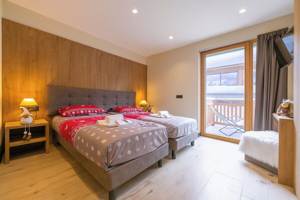 Appartement Familial, 2 chambres (Casa Luminosa Ski in -Ski out 100m) | 2 chambres, Wi-Fi gratuit, draps fournis