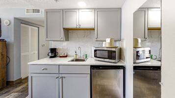 Fridge, microwave, coffee/tea maker, toaster