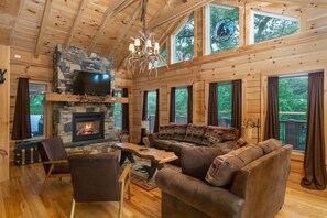 Smart TV, fireplace, table football, books