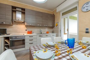 Family Apartment, 2 Bedrooms, 2 Bathrooms, Mountainside (Casa di Luciano few minutes from sea) | Private kitchen | Fridge, microwave, oven, stovetop