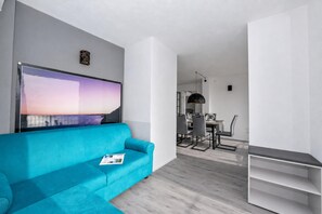 Standard Apartment, 3 Bedrooms, 2 Bathrooms, Mountainside (Rustichel fantastic Lake View) | Living area | TV - Rustichel Fantastic Lake View (Toscolano Maderno)