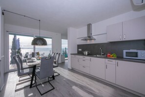 Standard Apartment, Multiple Bedrooms, 2 Bathrooms, Mountainside (Rustichel fantastic Lake View) | Dining - Rustichel Fantastic Lake View (Toscolano Maderno)