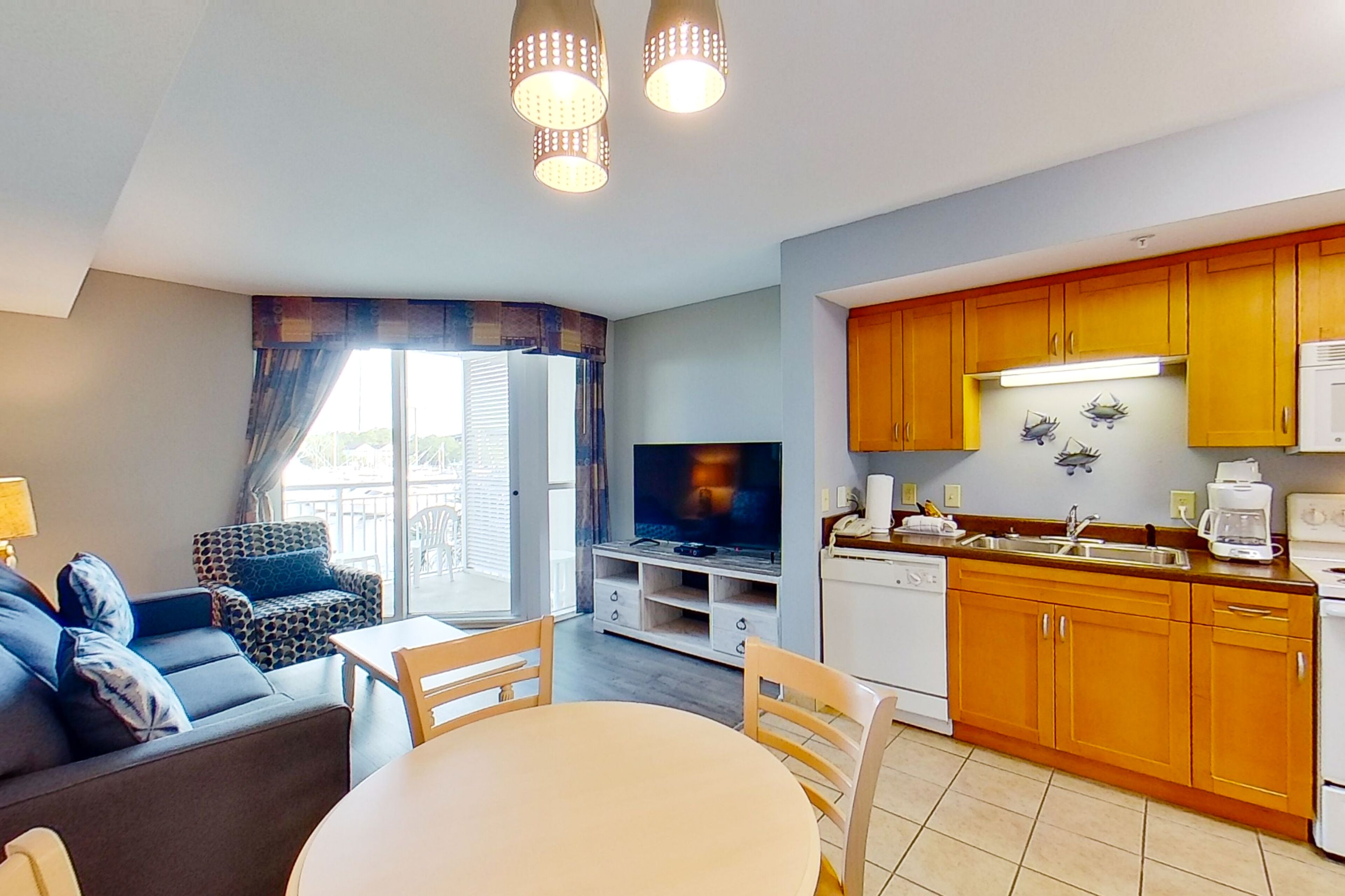Waterfront condo with pools, hot tub, W/D, AC & awesome view - one mile to beach