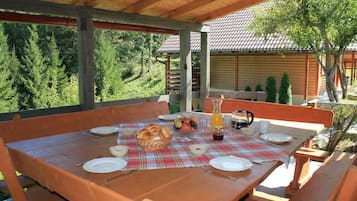 Family House, 4 Bedrooms, 2 Bathrooms, Mountainside (Chalet Zavrh with Private Heated Pool) | Outdoor dining