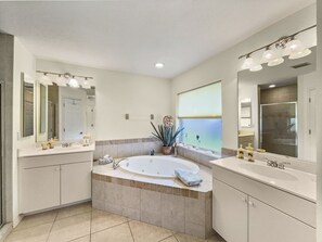 Bathtub, hair dryer, towels