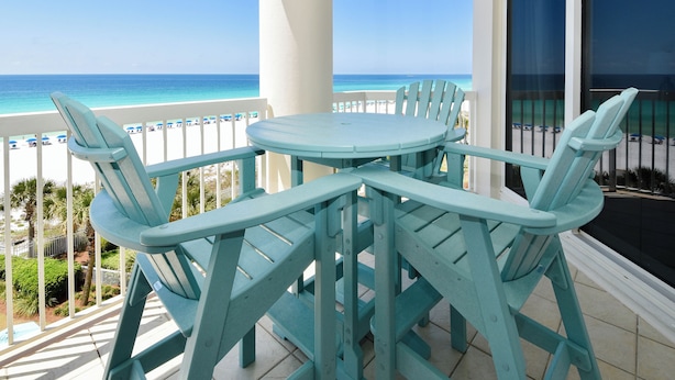 A turquoise outdoor seating area with a view of the beach and ocean. - Updated Beachfront Condo w/ Easy Beach Access at Silver Beach Towers! πβπ΄ (Destin)