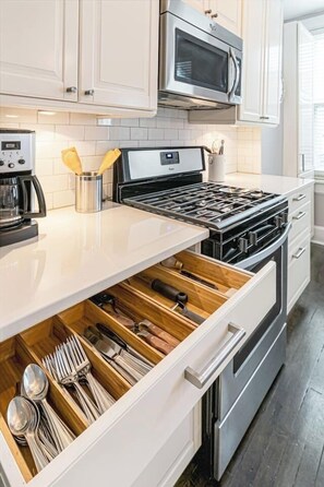 Coffee/tea maker, fridge, microwave, oven