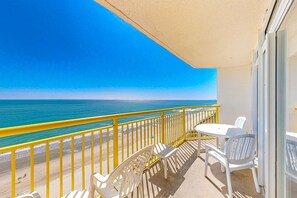 Outdoor dining - 15th floor oceanfront condo w/ central AC, shared hot tub, shared pool, WiFi (North Myrtle Beach)