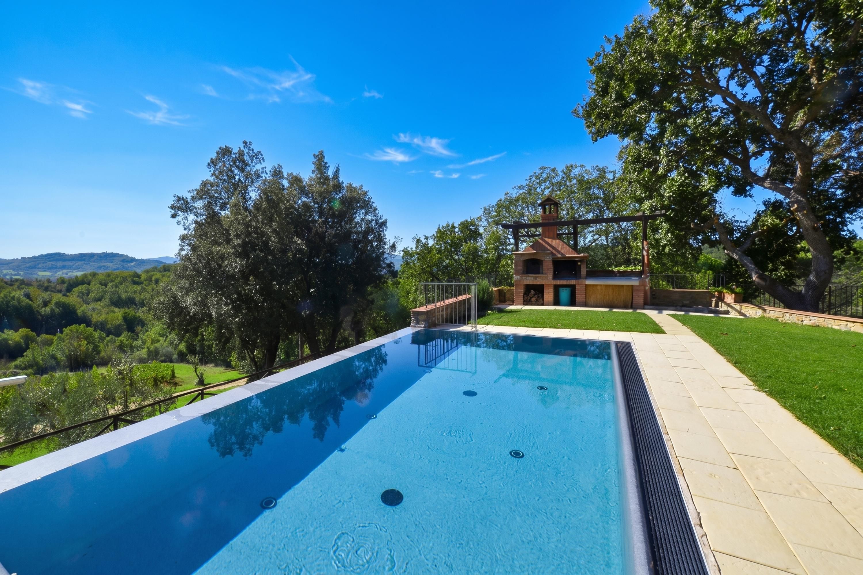 Family Villa, 6 Bedrooms, Fireplace, Mountainside (Villa Paradiso 12) | Pool | Seasonal outdoor pool, an infinity pool