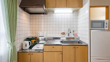 Superior Condo, Non Smoking | Private kitchen | Fridge, microwave, stovetop, cookware/dishes/utensils