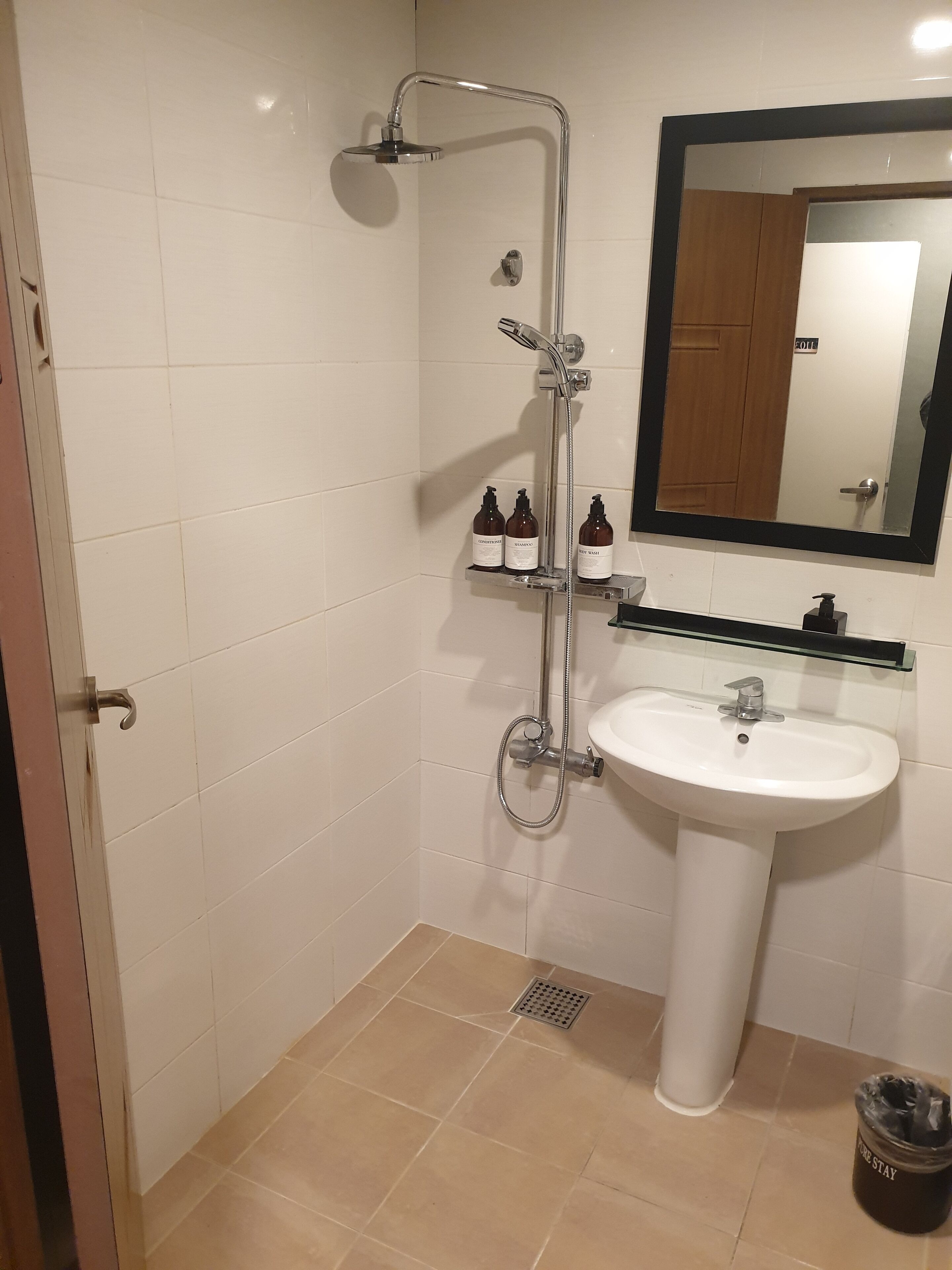 shower, hair dryer, slippers, soap