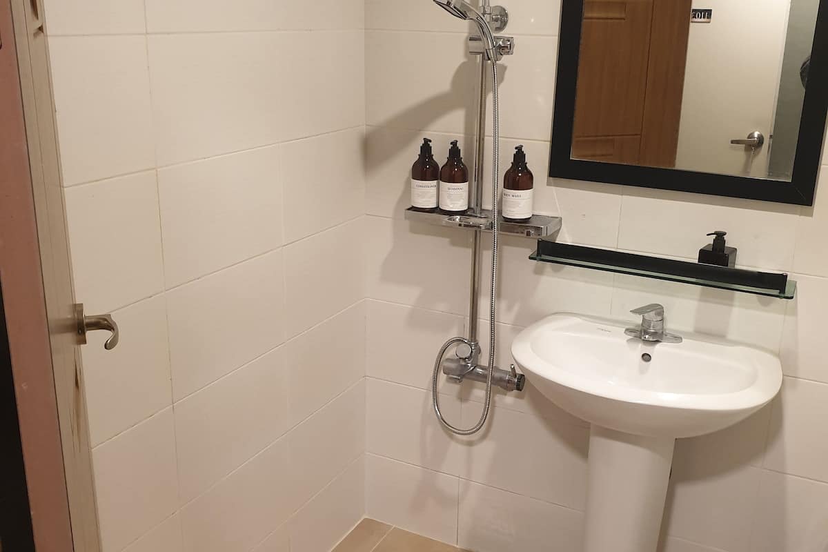 shower, hair dryer, slippers, soap