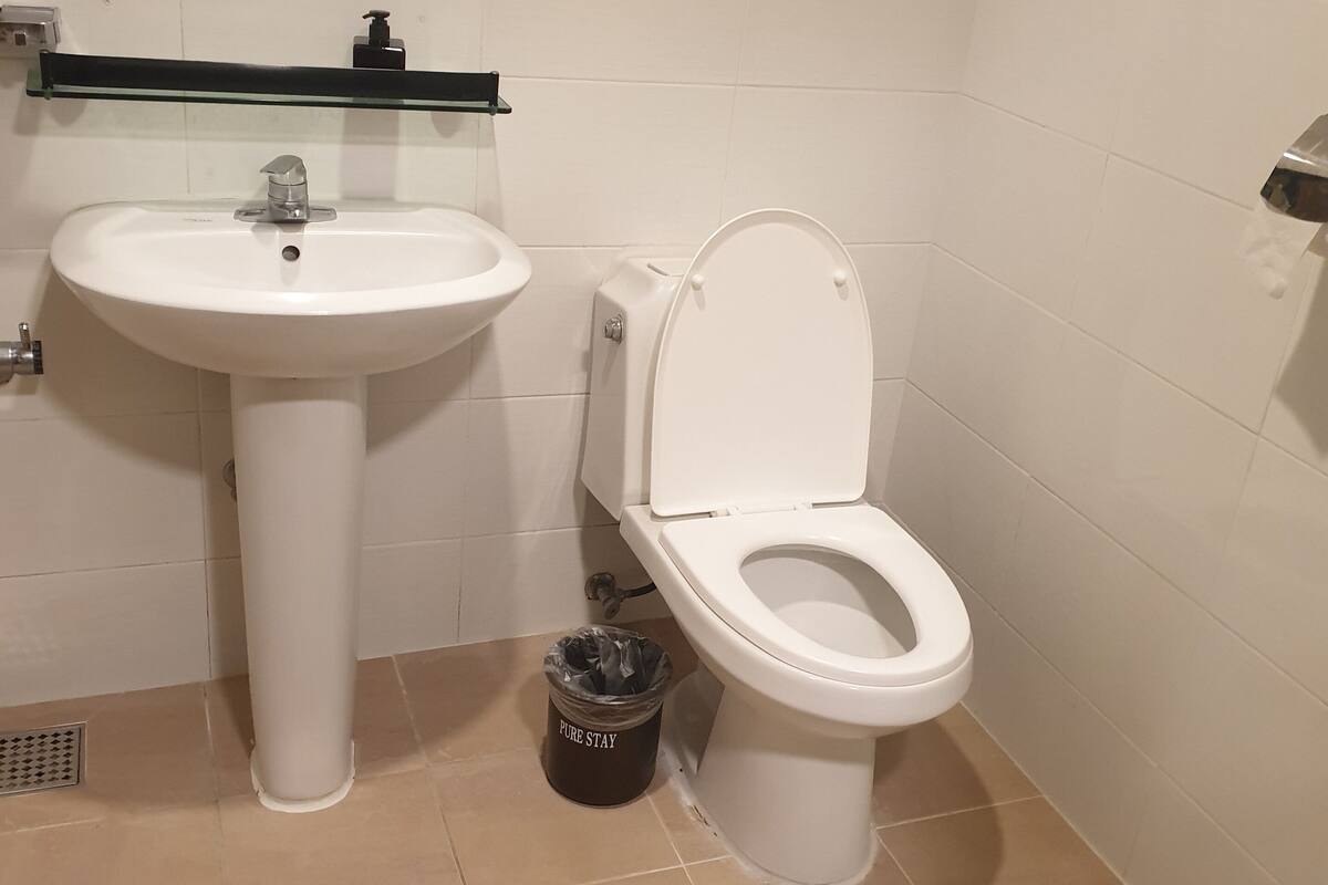 shower, hair dryer, slippers, soap