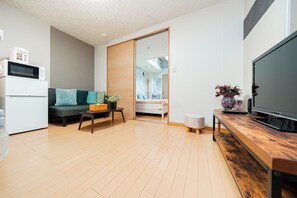 Appartement Affaires, 2 chambres (suzuki8) | Coin séjour | Télévision à écran plat