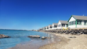 On the beach, sun-loungers, beach towels