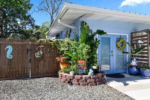 Welcome to a charming home with a welcoming entrance, featuring a decorative horse figure and a 'Welcome' sign.