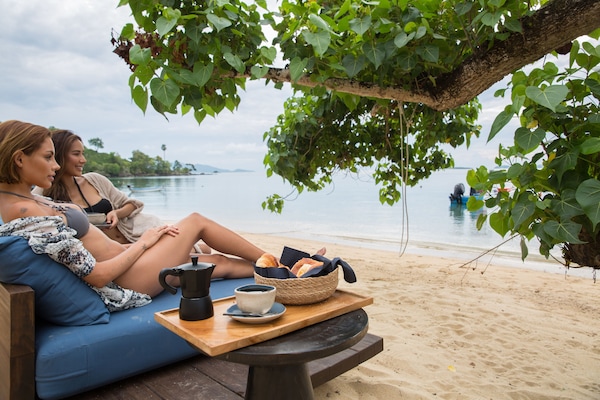 On the beach, white sand, windsurfing, kayaking