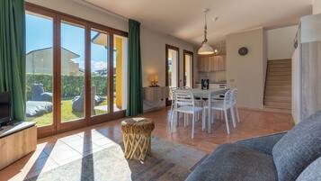 21-inch flat-screen TV with satellite channels, TV